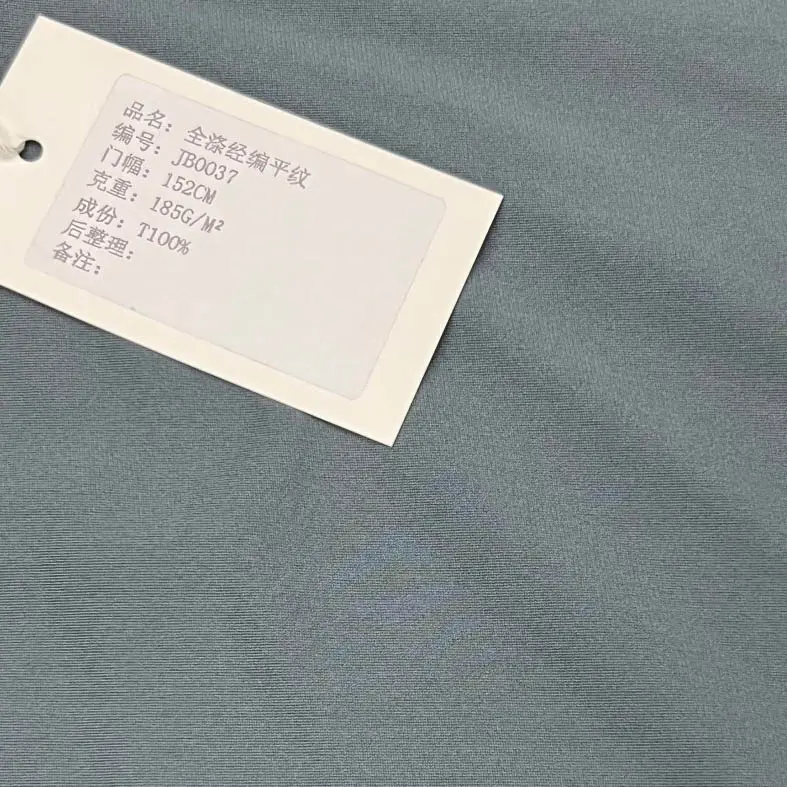 In Stock 100%Polyester 4 Way Elastic Plain Warp Knitted Fabric for Garment Swimsuit (4).jpg