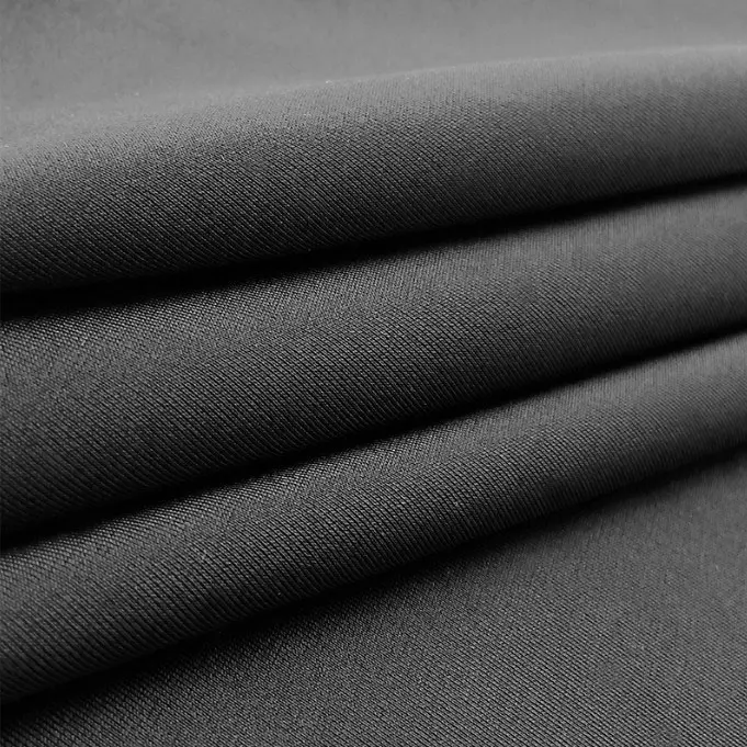 Dupont Lycra swimming cloth four side elastic single side warp knitted nylon plain fabric nylon matte knitted swimsuit fabric (4).jpg
