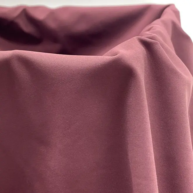 Warp knitted nylon lycra elastic fabric with double warp flat ice silk and quick-drying casual sports fabric (2).jpg