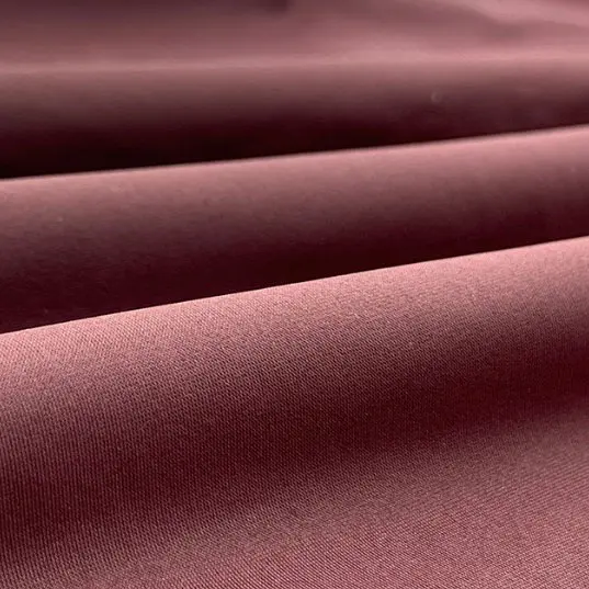 Warp knitted nylon lycra elastic fabric with double warp flat ice silk and quick-drying casual sports fabric (3).jpg