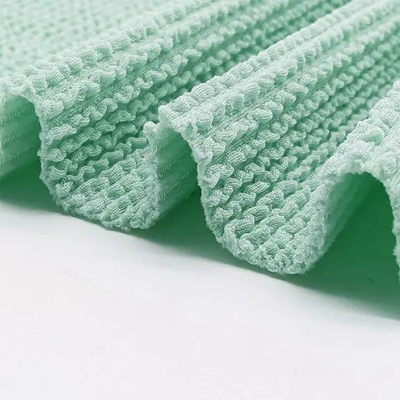 Polyester ammonia elastic stairs crepe fabric polyester single side jacquard fabric luggage Fashion swimsuit swimsuit knitted jacquard fabric (6).jpg